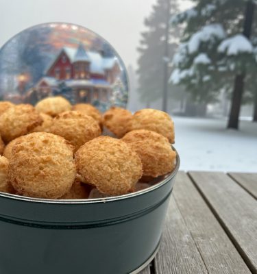 Holiday tin filled with mini coconut macaroons